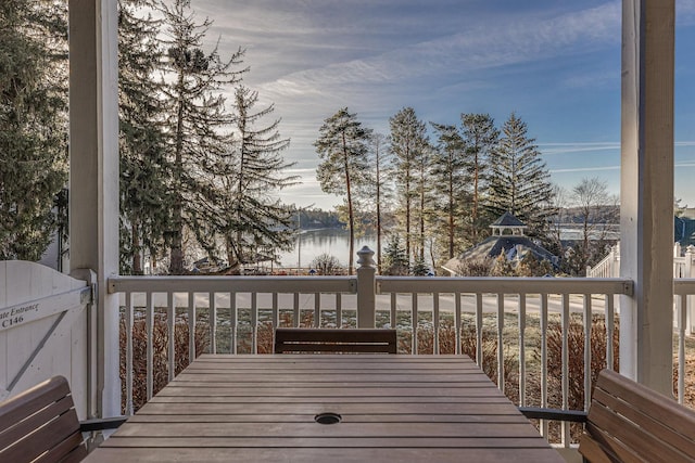 deck featuring a water view