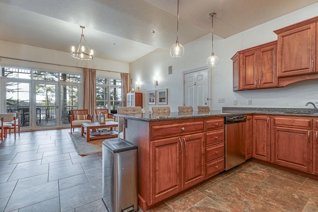 kitchen featuring brown cabinetry, dark stone counters, a sink, pendant lighting, and stainless steel dishwasher