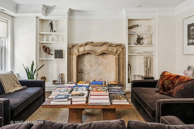 living room featuring built in features, wood finished floors, and ornamental molding