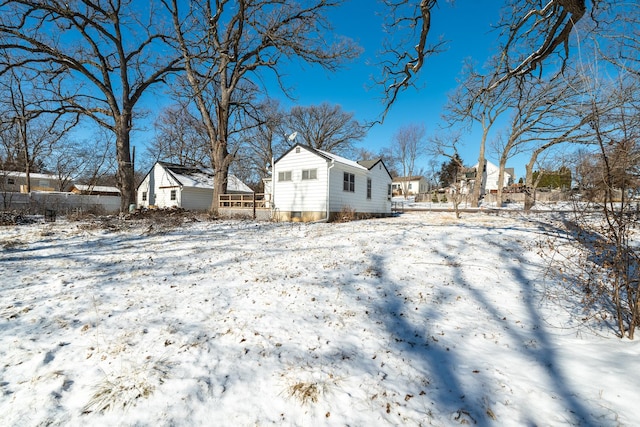 view of snow covered property