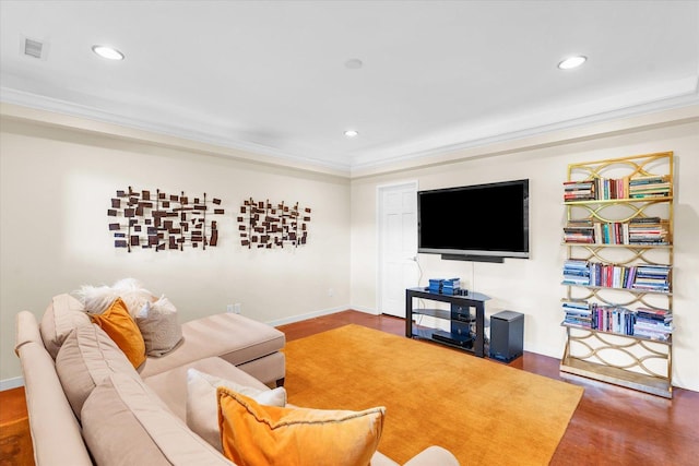 living area with recessed lighting, visible vents, baseboards, and ornamental molding