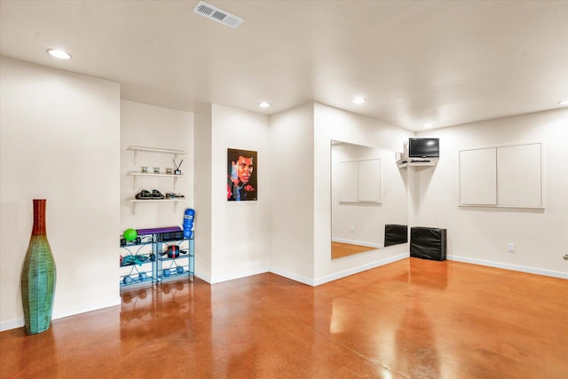 interior space featuring recessed lighting, baseboards, and visible vents