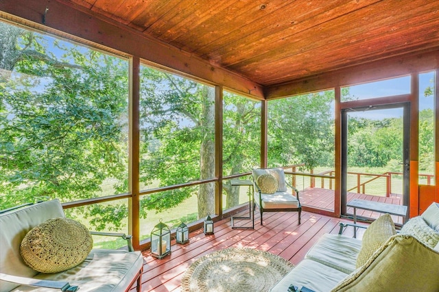 unfurnished sunroom featuring wooden ceiling