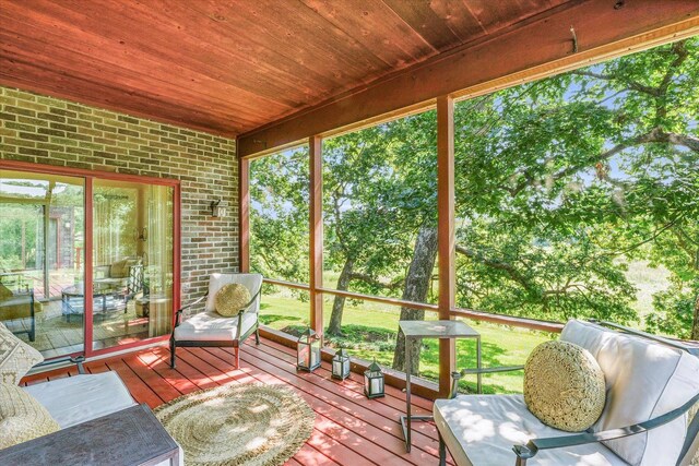 sunroom / solarium with wooden ceiling