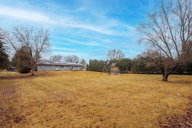 view of yard featuring a playground