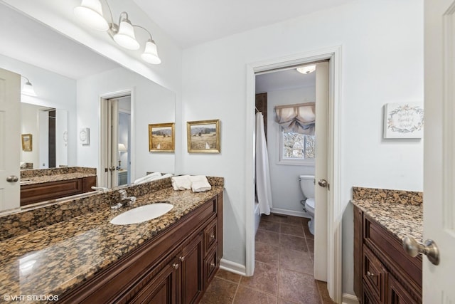 bathroom with toilet, a shower with shower curtain, tile patterned flooring, baseboards, and vanity