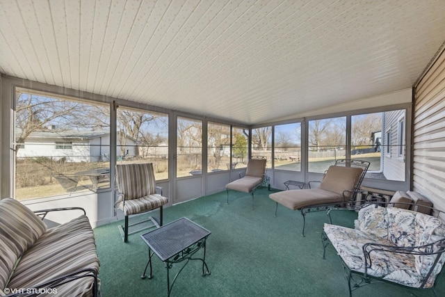 sunroom with vaulted ceiling