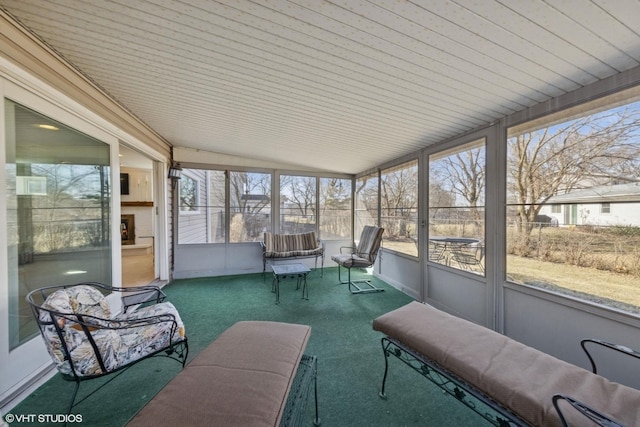 sunroom with vaulted ceiling