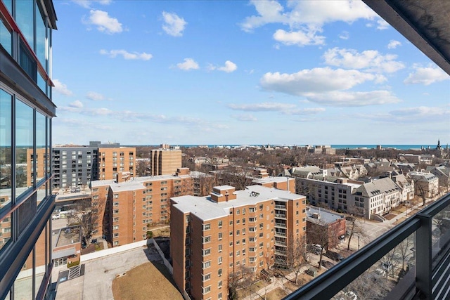 property's view of city featuring a water view