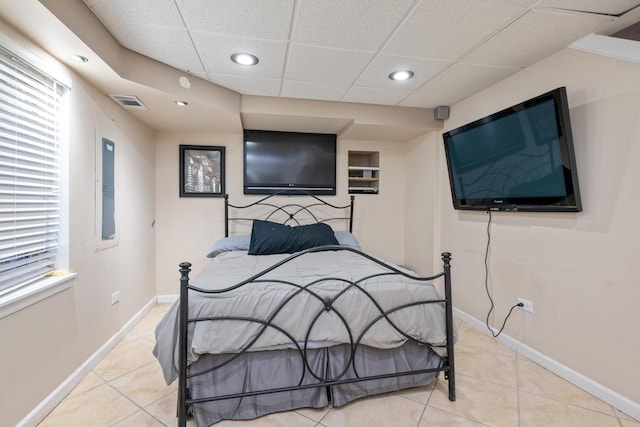 tiled bedroom with recessed lighting, visible vents, baseboards, and a paneled ceiling