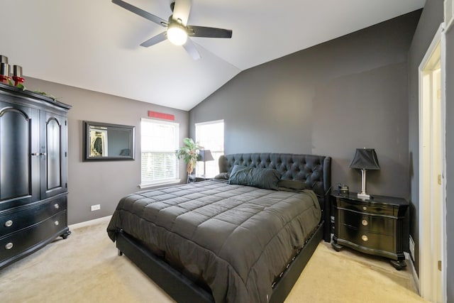 bedroom with baseboards, light colored carpet, a ceiling fan, and vaulted ceiling