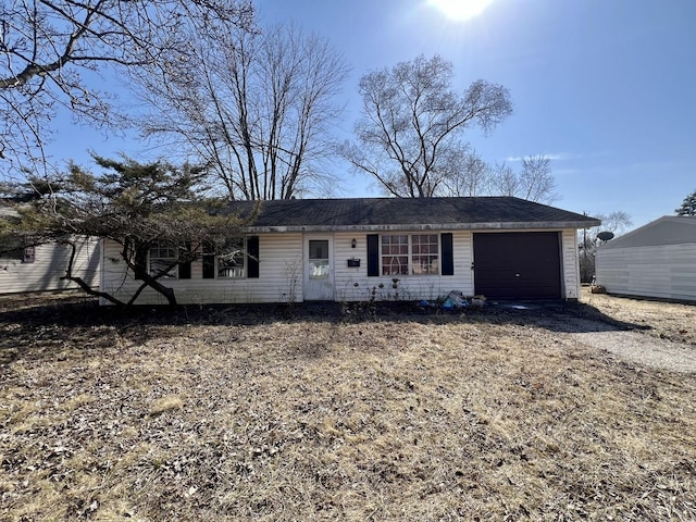 916 Sunset Rdg, Danville, IL 61832 - ranch-style home featuring an attached garage and driveway