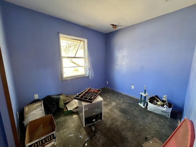 916 Sunset Rdg, Danville, IL 61832 - interior space with a textured ceiling and baseboards