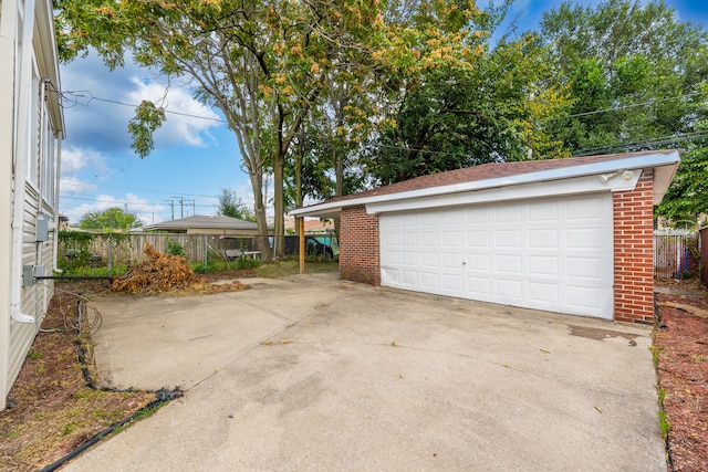 detached garage with fence