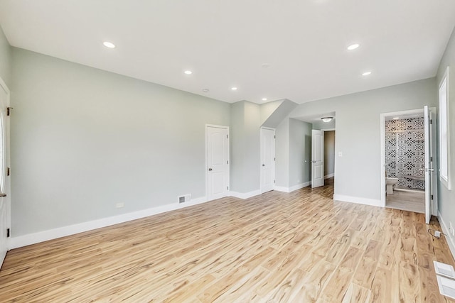 interior space featuring visible vents, recessed lighting, light wood-type flooring, and baseboards