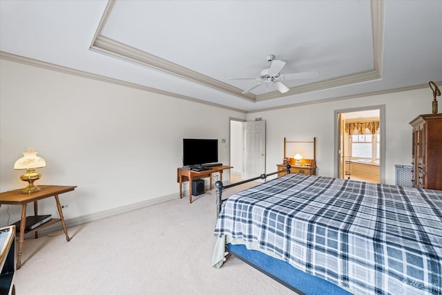 bedroom with carpet flooring, baseboards, crown molding, and a raised ceiling