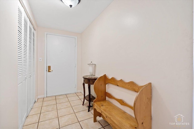 entrance foyer featuring light tile patterned floors