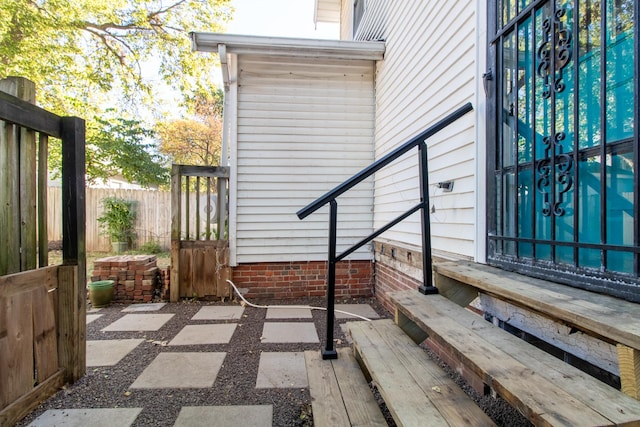 view of patio / terrace featuring fence