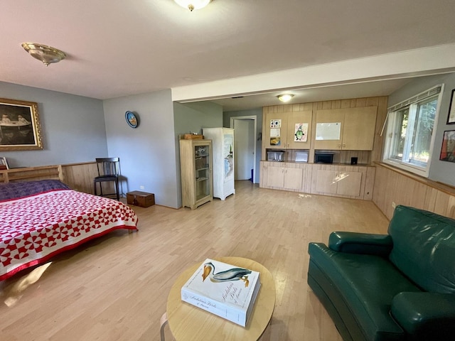 bedroom with light wood finished floors