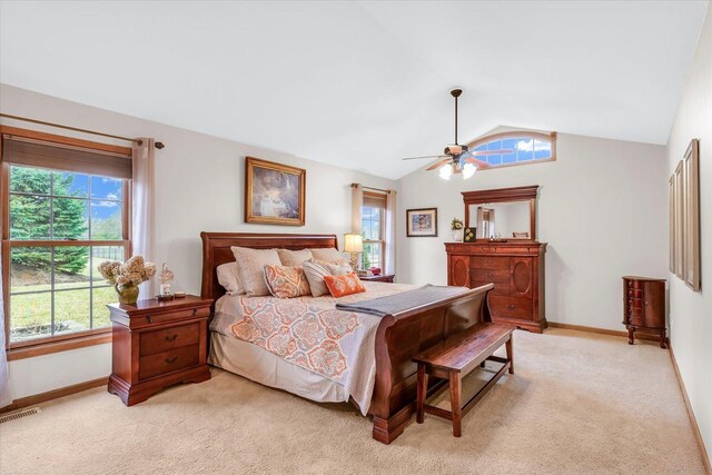 bedroom with light carpet, visible vents, baseboards, and vaulted ceiling