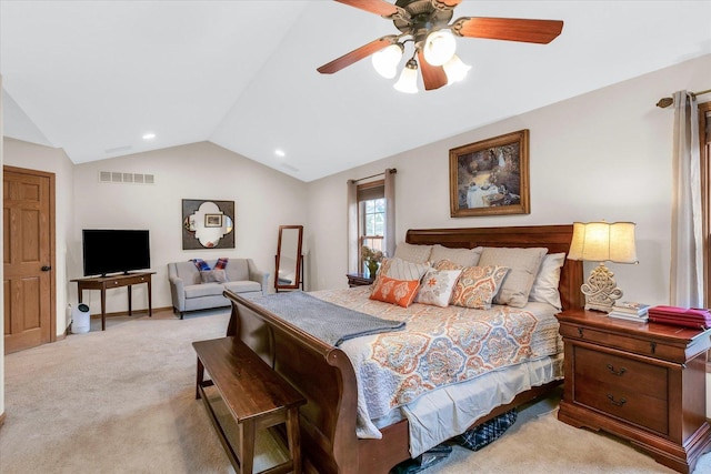 bedroom with vaulted ceiling, carpet flooring, a ceiling fan, and visible vents