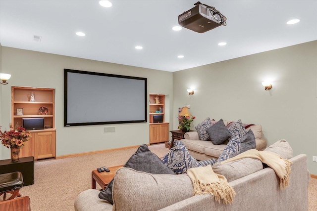 cinema featuring recessed lighting, baseboards, and light carpet