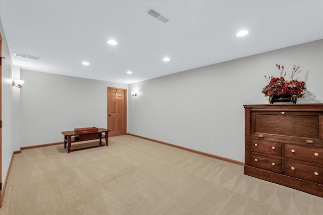 interior space featuring recessed lighting, light colored carpet, visible vents, and baseboards