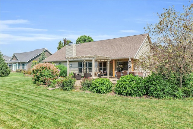 rear view of house featuring a patio, a lawn, a chimney, and a pergola