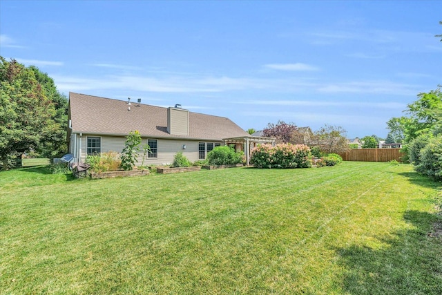 view of yard with fence