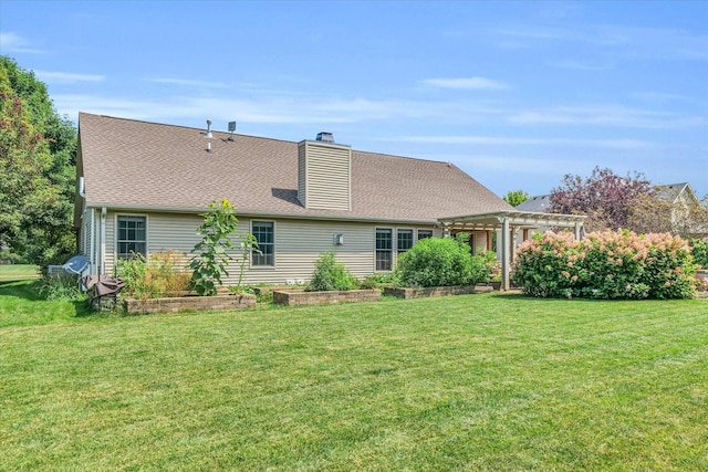 back of house featuring a shingled roof, a yard, a pergola, and a chimney