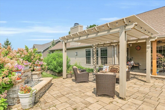 view of patio / terrace featuring an outdoor living space and a pergola