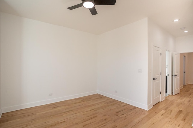 empty room with light wood-style flooring, recessed lighting, baseboards, and ceiling fan