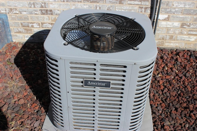 exterior details featuring cooling unit