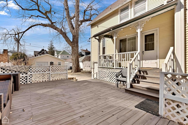 wooden deck featuring fence