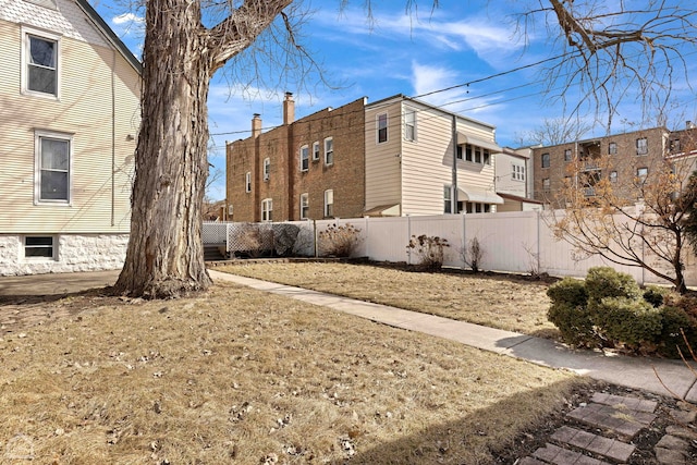 view of yard featuring fence