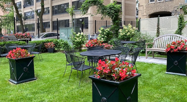 exterior space featuring a yard and fence