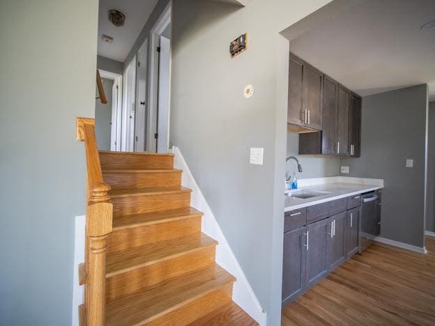 interior space featuring wood finished floors and baseboards