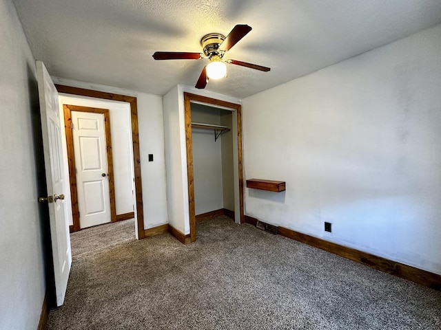 unfurnished bedroom featuring a ceiling fan, a textured ceiling, a closet, carpet floors, and baseboards