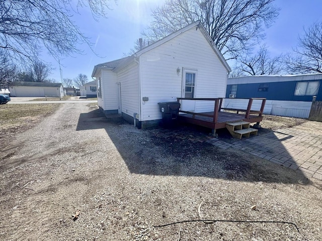 rear view of house with a deck