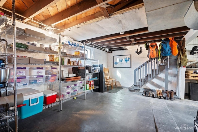 basement featuring concrete block wall