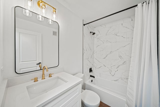 full bathroom featuring shower / tub combo with curtain, vanity, and toilet