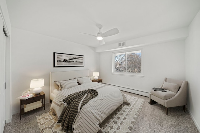 bedroom with visible vents, baseboards, ceiling fan, carpet flooring, and baseboard heating