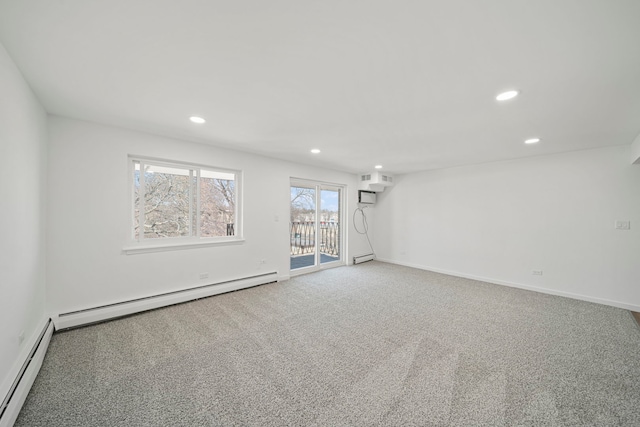 unfurnished room featuring a baseboard heating unit, recessed lighting, carpet floors, baseboards, and baseboard heating