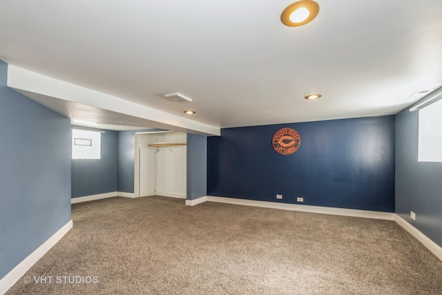 basement with recessed lighting, baseboards, and carpet