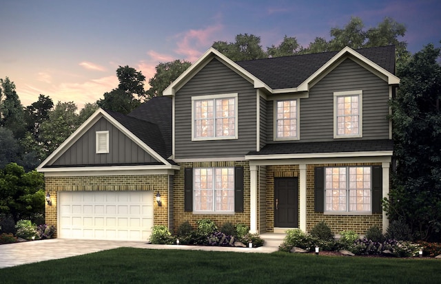 traditional-style house featuring brick siding, board and batten siding, concrete driveway, and an attached garage