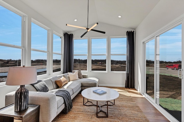 sunroom / solarium with vaulted ceiling