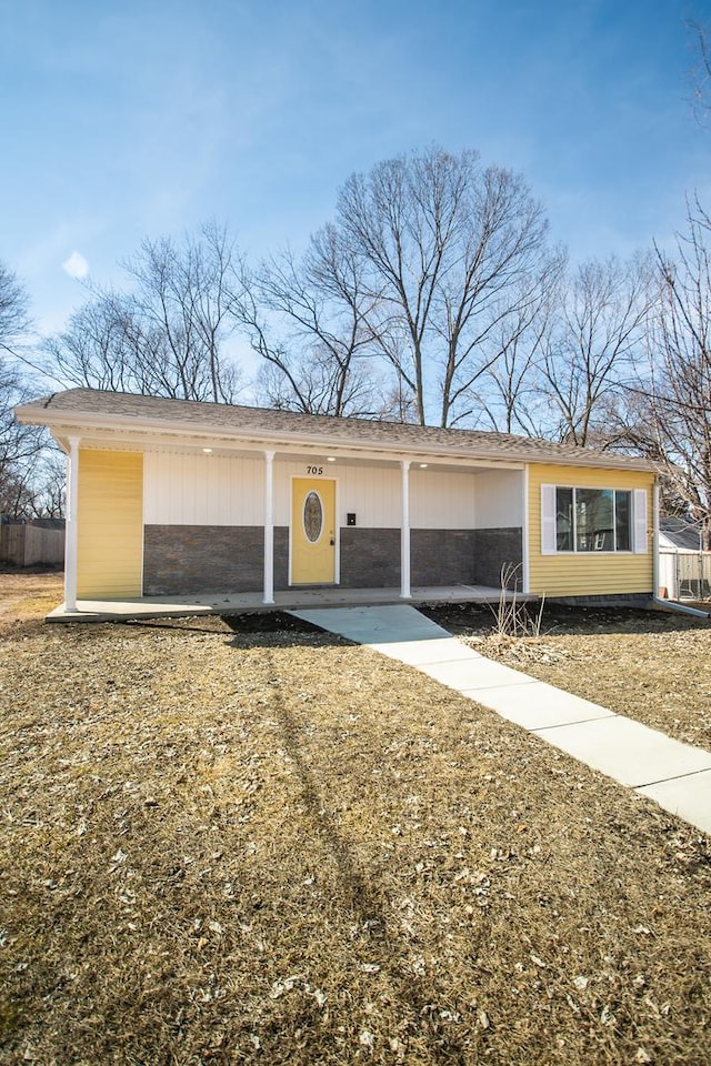 view of front of home with fence