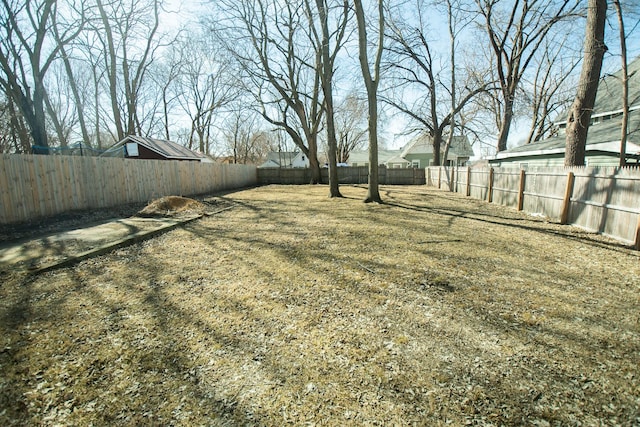 view of yard featuring a fenced backyard