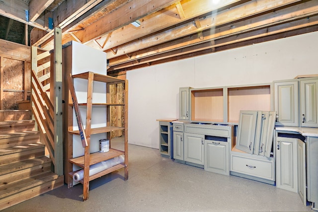 unfinished basement with stairway