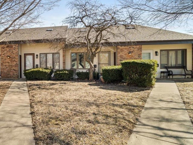 view of front of property with brick siding